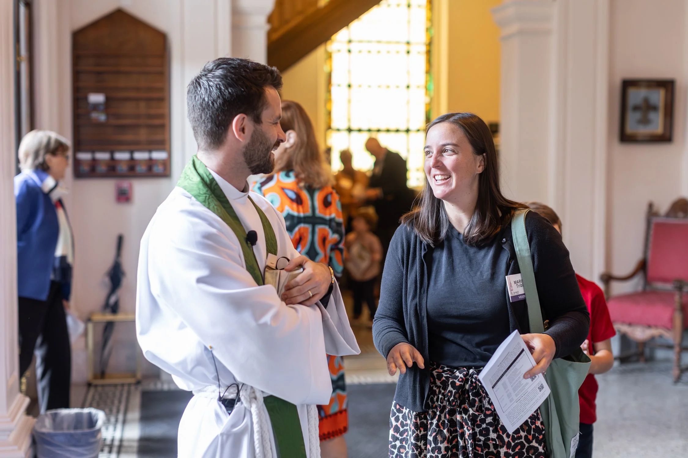Parishioners connecting with Clergy