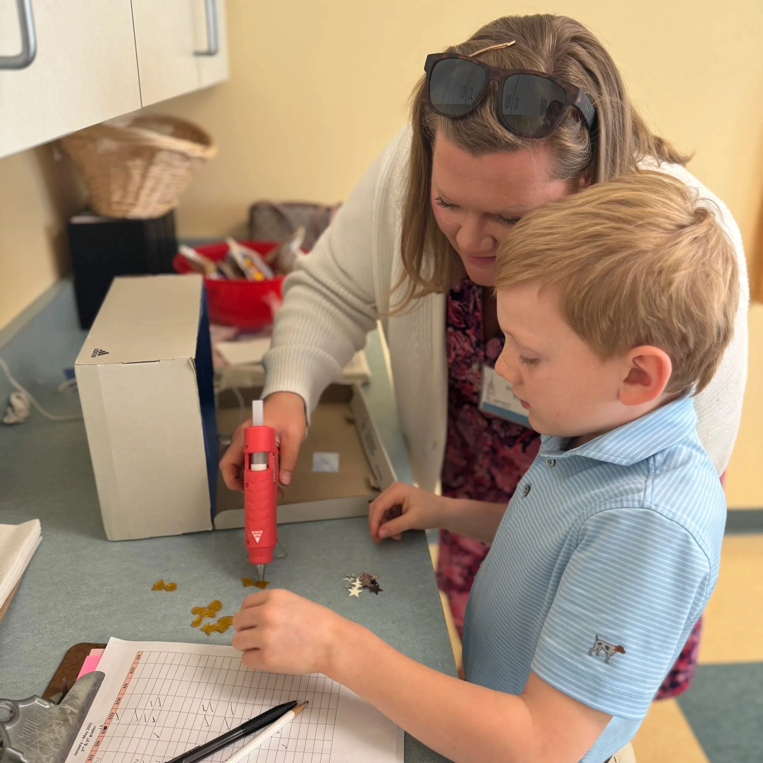 A parent volunteer and child in Sunday School at St. James's Episcopal Church