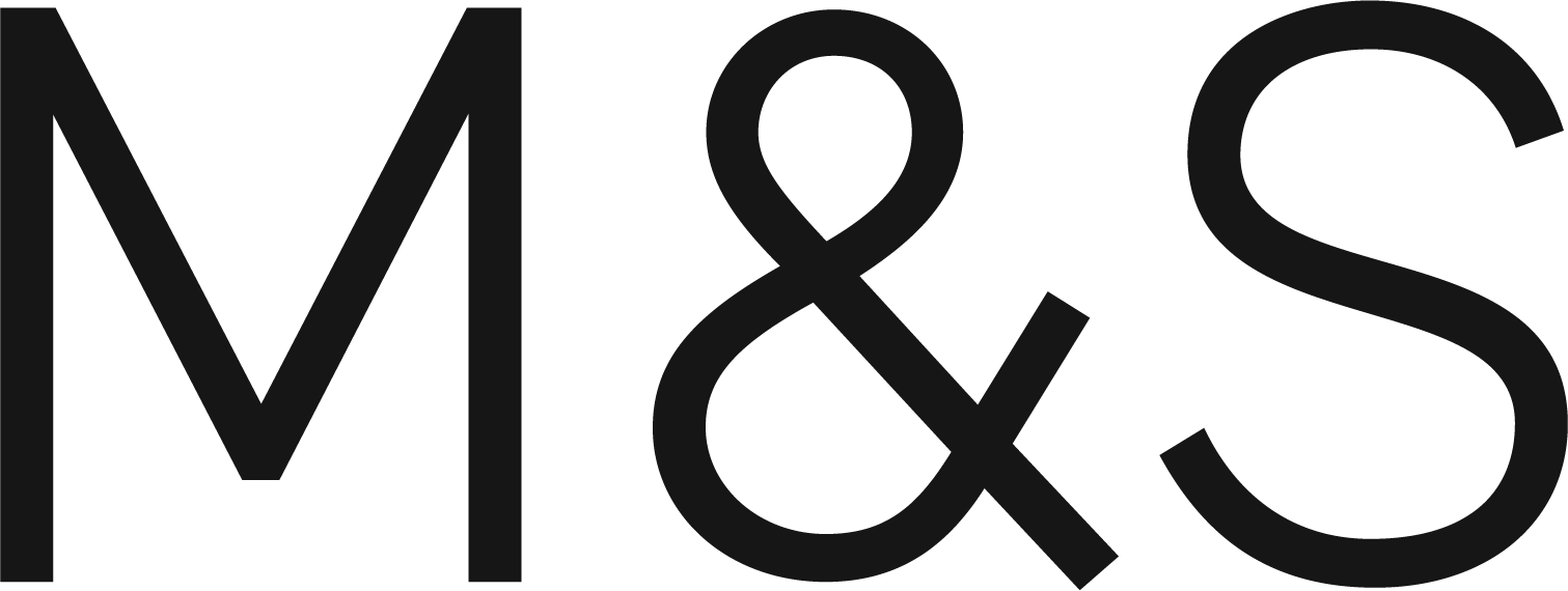 Close-up of black text on a dark background, reading "M&S" in large letters.