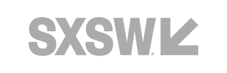 SXSW logo in grey text with a small downward arrow.