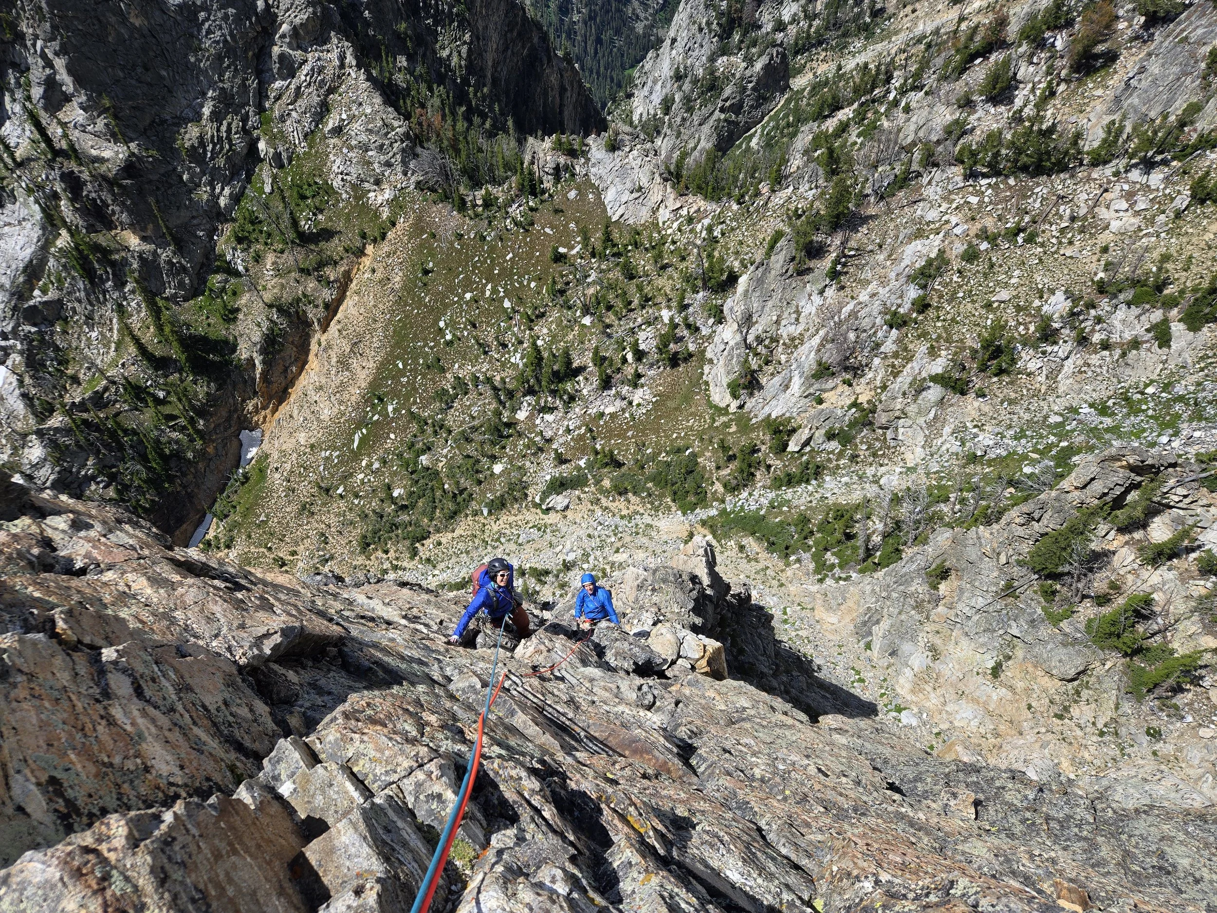 Guided rock climbing instruction on granite cliffs in New Hampshire with a professional climbing guide