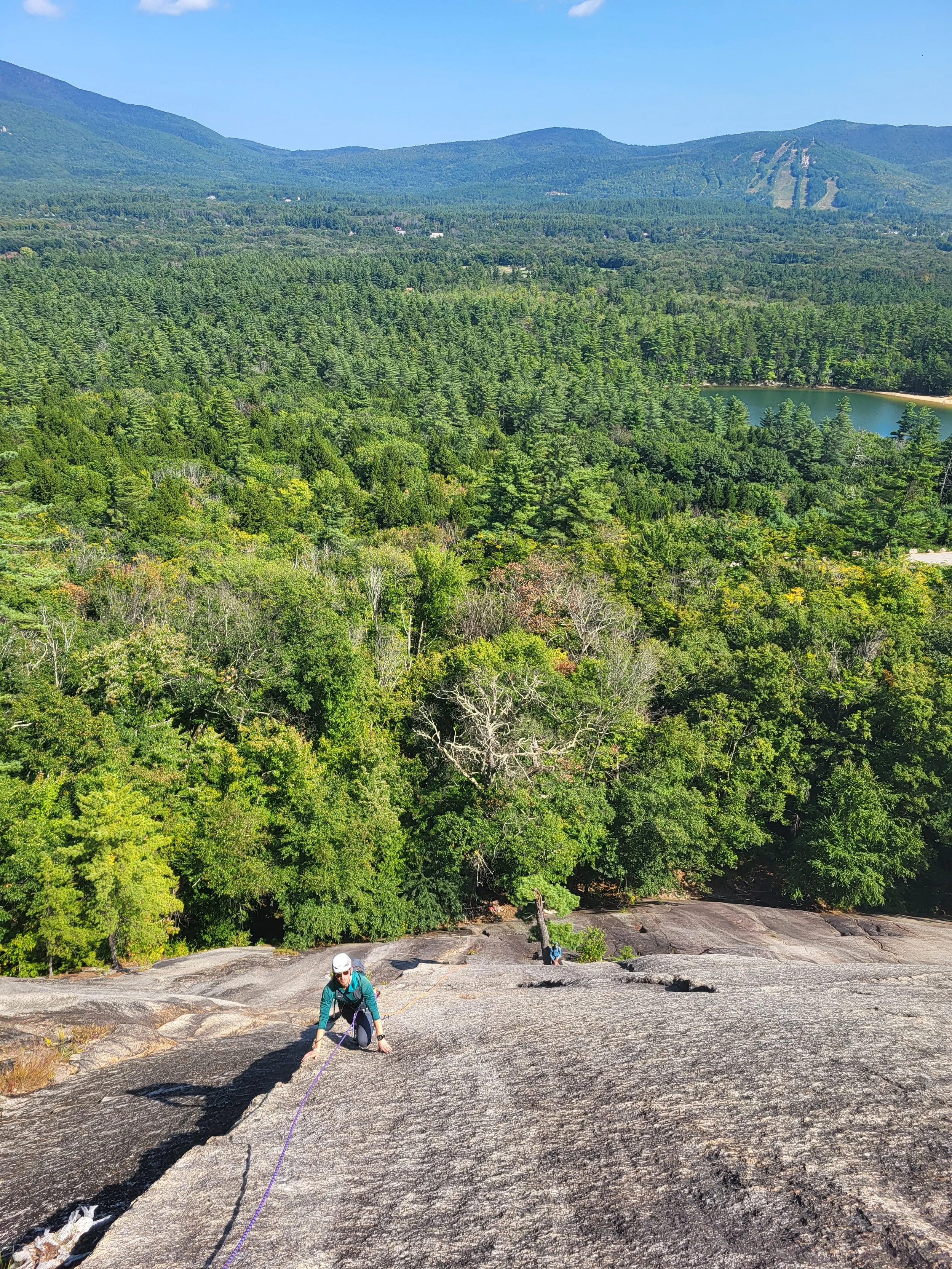 Climber ascending the Standard Route on Whitehorse Ledge