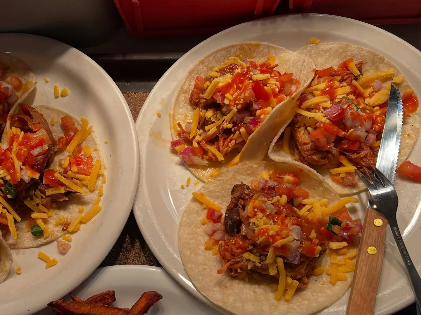 Special Pulled Pork tacos 🌮 of hamburger ranch and BBQ 
Corn tacos loaded with sweet BBQ-marinated pulled pork, topped with fresh pico de gallo, shredded cheddar, and crisp green onions