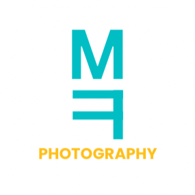 Logo with a teal capital 'M' and a teal mirror image of the 'F' inverted vertically, with the word 'PHOTOGRAPHY' in yellow below