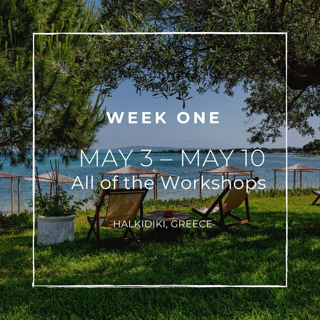 A scenic beach view with two deck chairs and umbrellas on lush green grass, overlooking calm blue sea and distant islands, with trees framing the scene and text overlay promoting creative writing workshops in Halkidiki, Greece from May 3 to May 10.