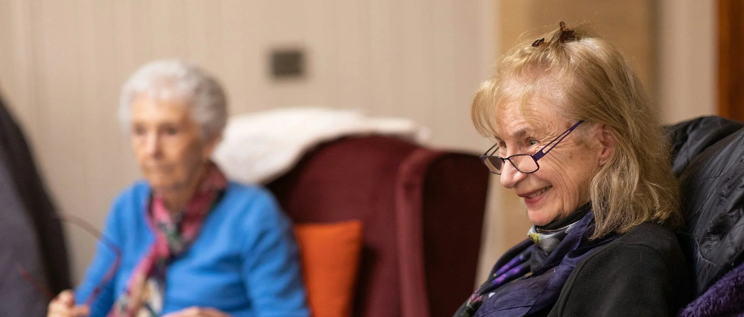 Two women at a book club event