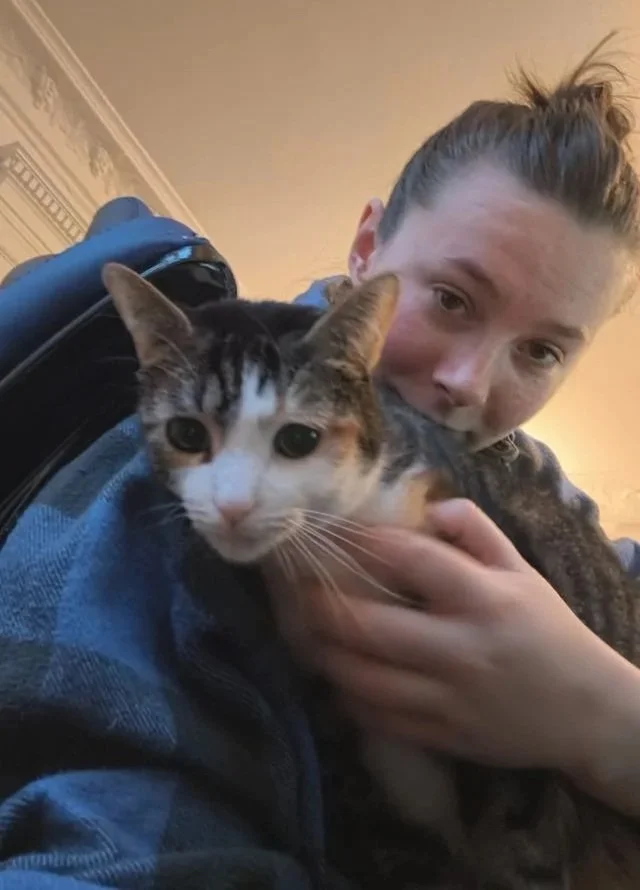 Emily Schaal with calico cat