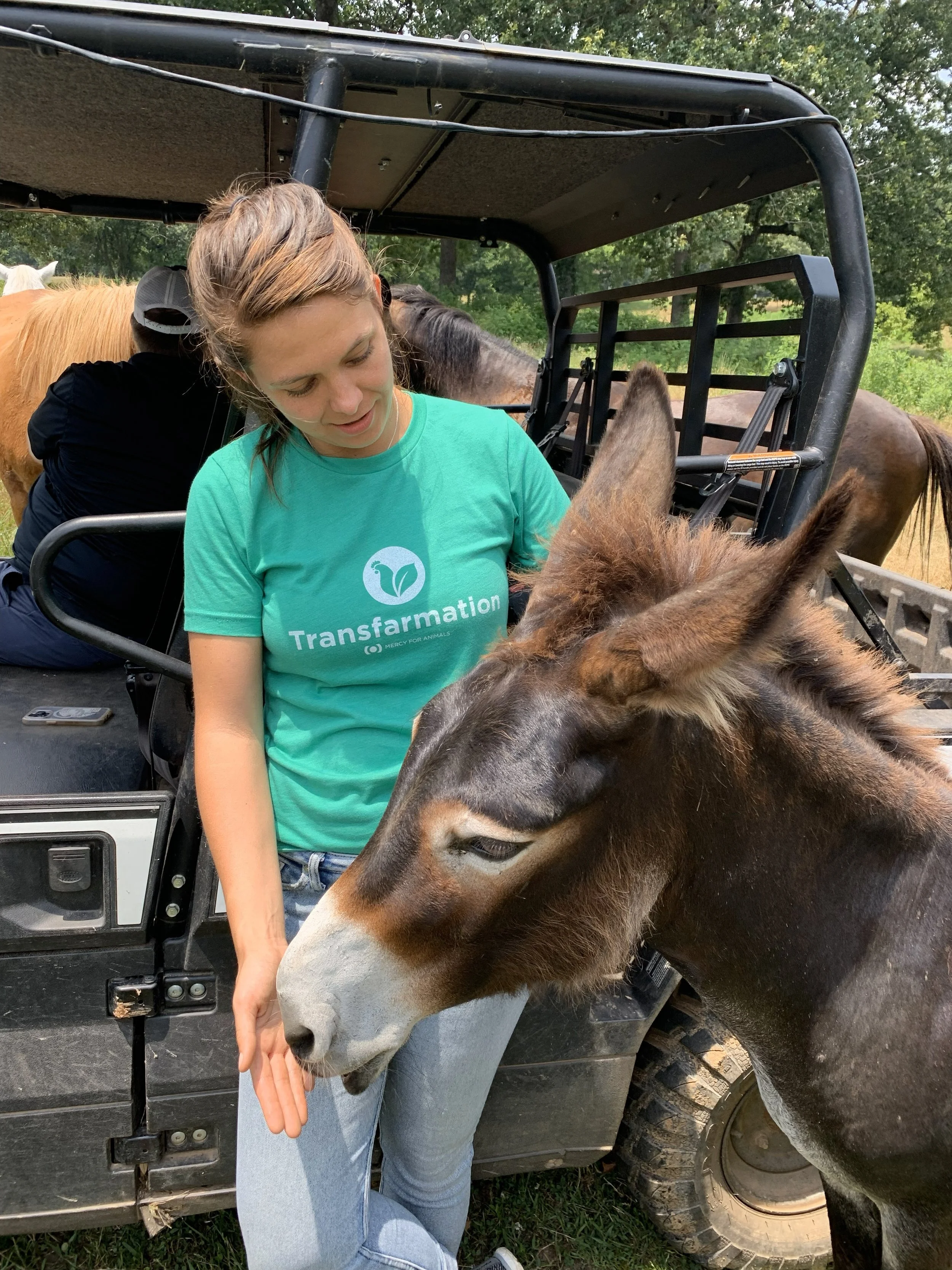 Team Member Wearing Transfarmation Shirt Pets Animal