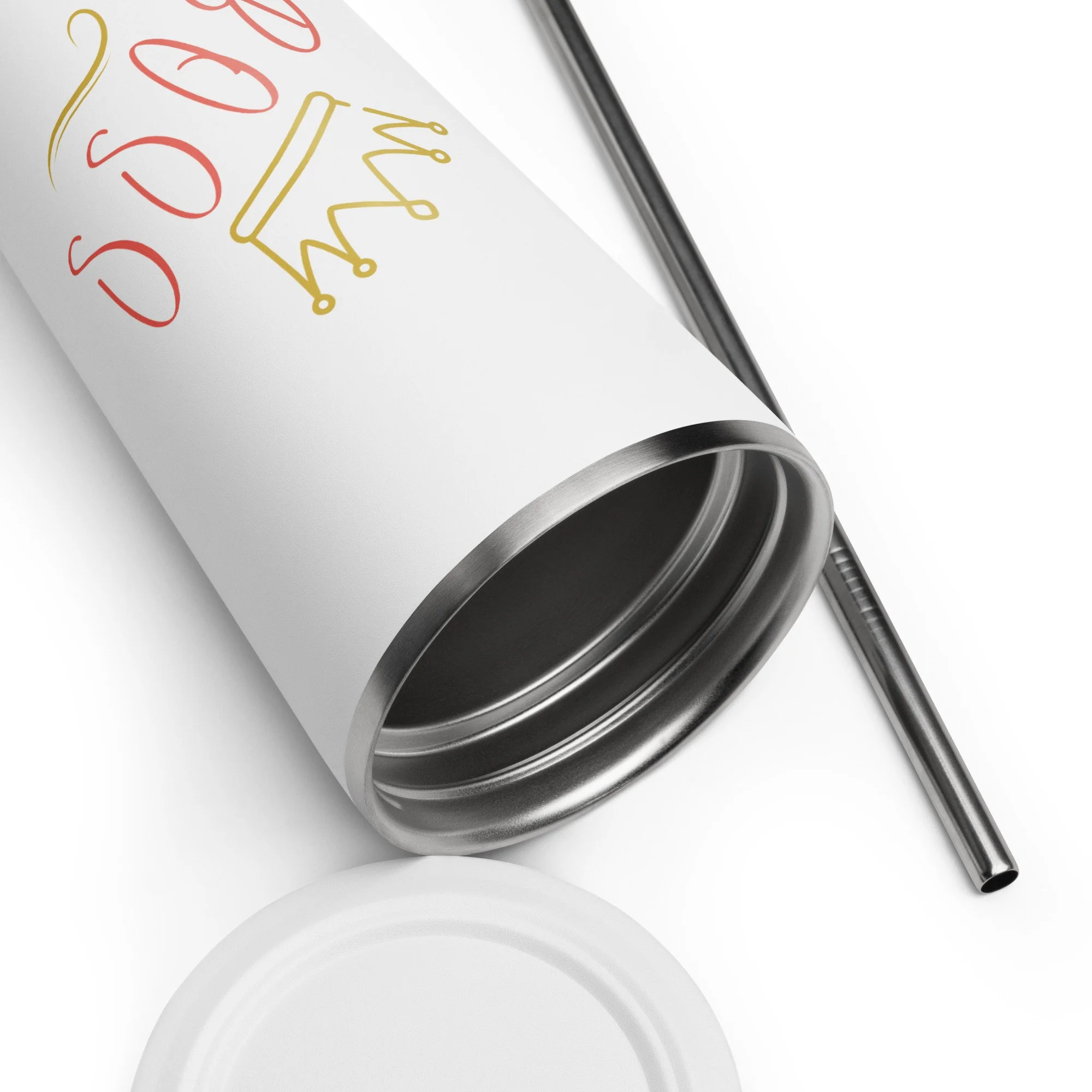 Close-up of the insulated tumbler showing the “Bake Boss” crown design near the rim with straw beside it.