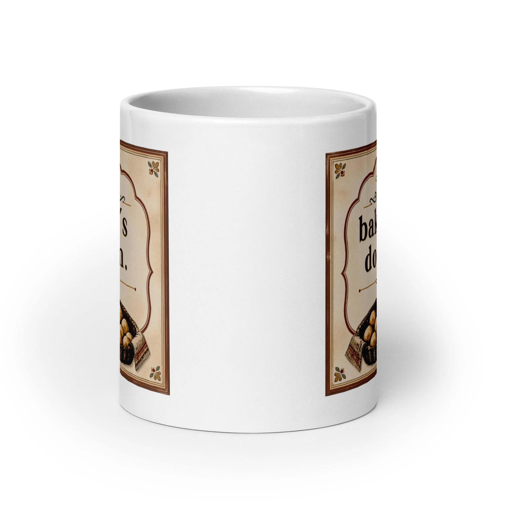 White ceramic mug showing the wraparound “A baker’s dozen” design from the side.