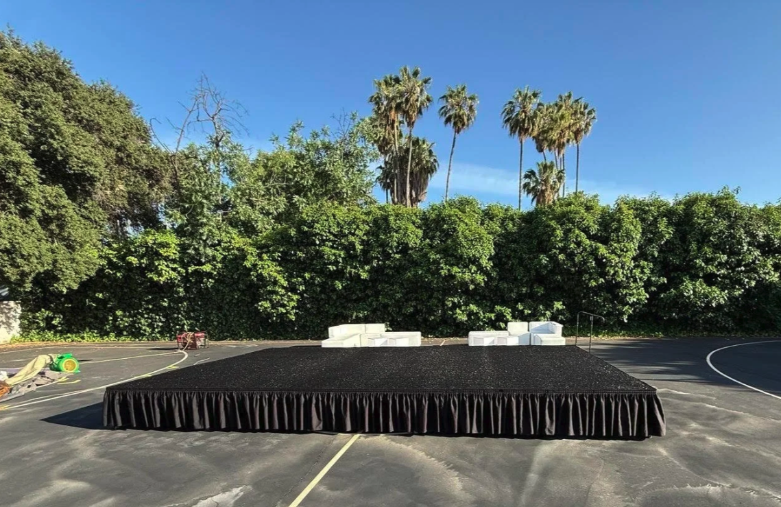Stage with Black Turf at CMHS ($1650/day)