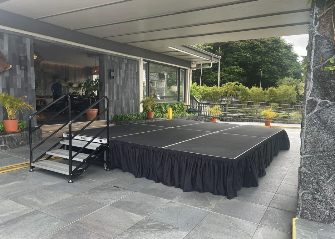 Stage with Black Skirting ( $1050/day)