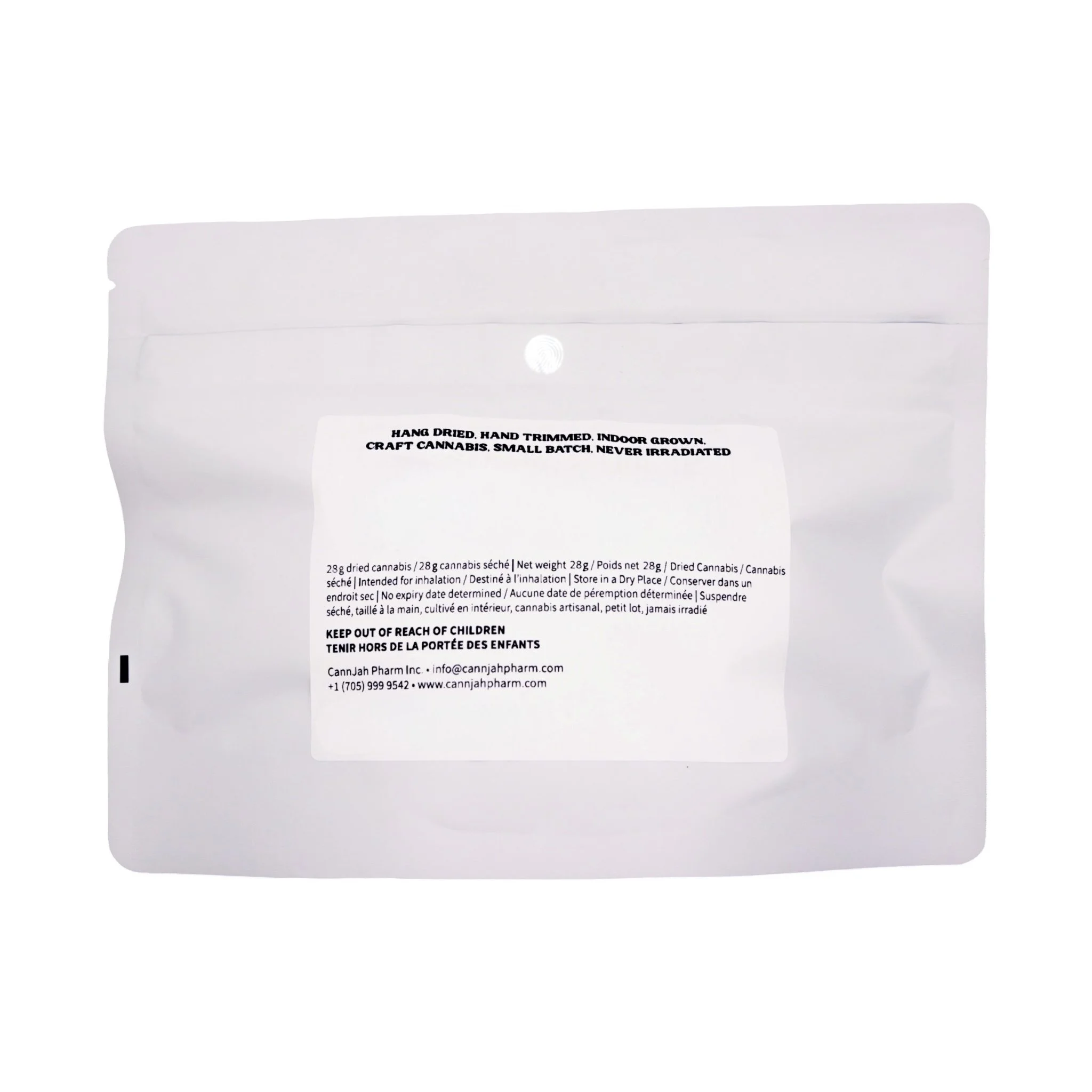 Close-up of white cannabis packaging with black text describing dried cannabis, weight, and storage instructions.
