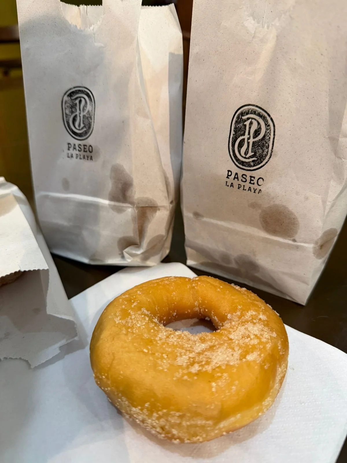 Empaques para los churros marcados con el logo de Paseo la Playa