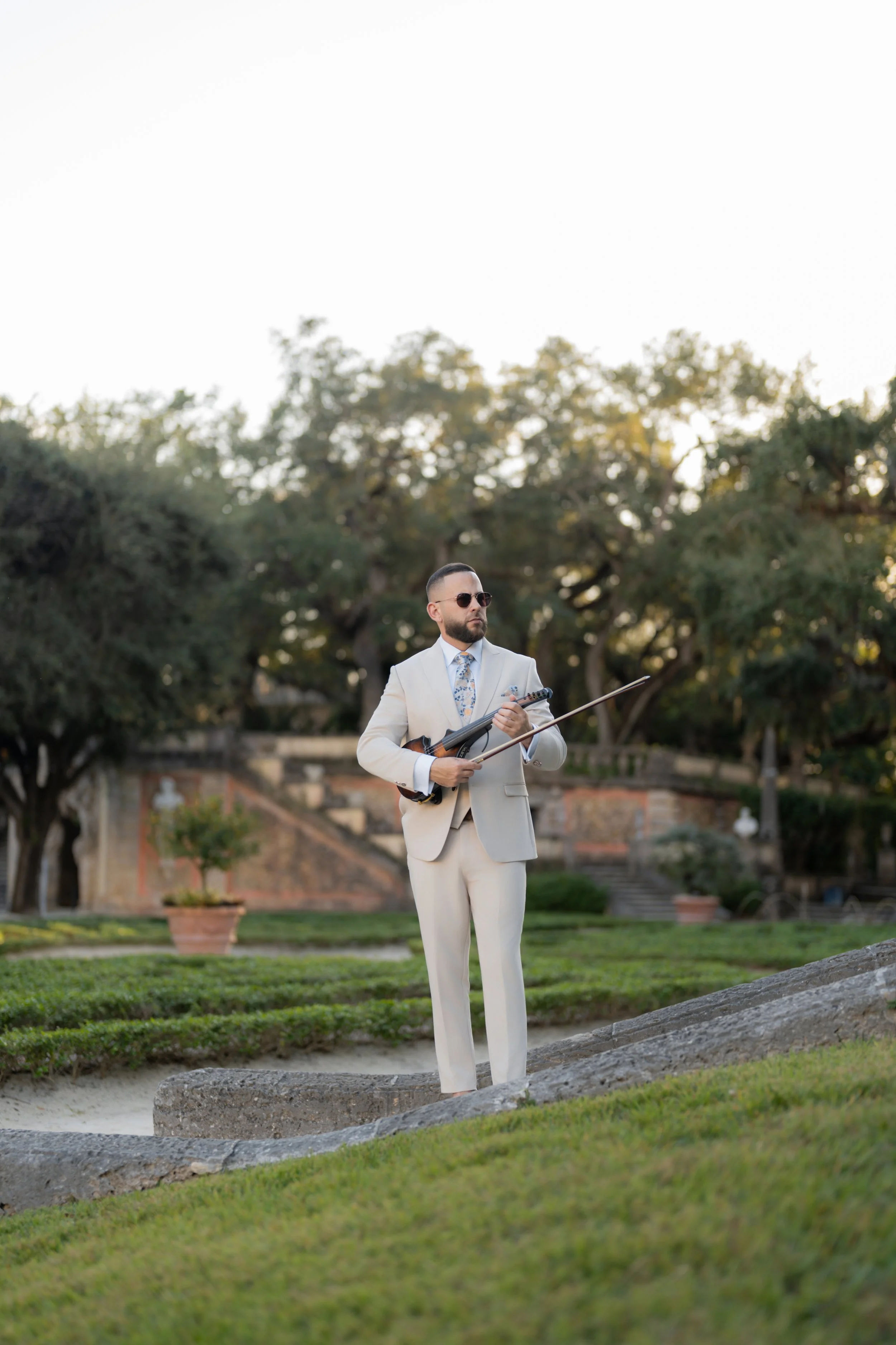 Wedding cocktail hour violinist in Miami performing live violin music at a luxury wedding venue