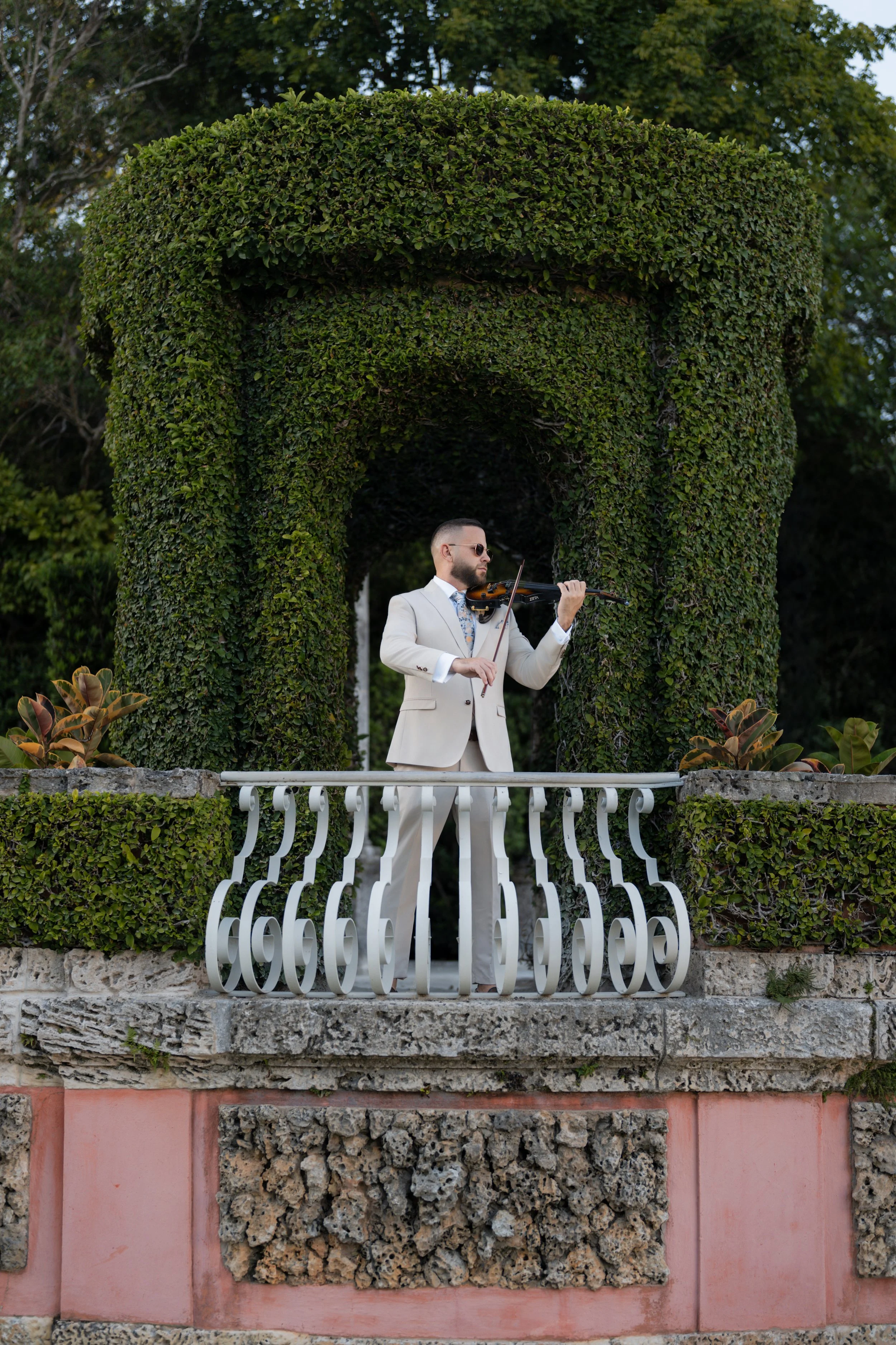 Miami wedding violinist performing live ceremony music at a luxury wedding venue in South Florida