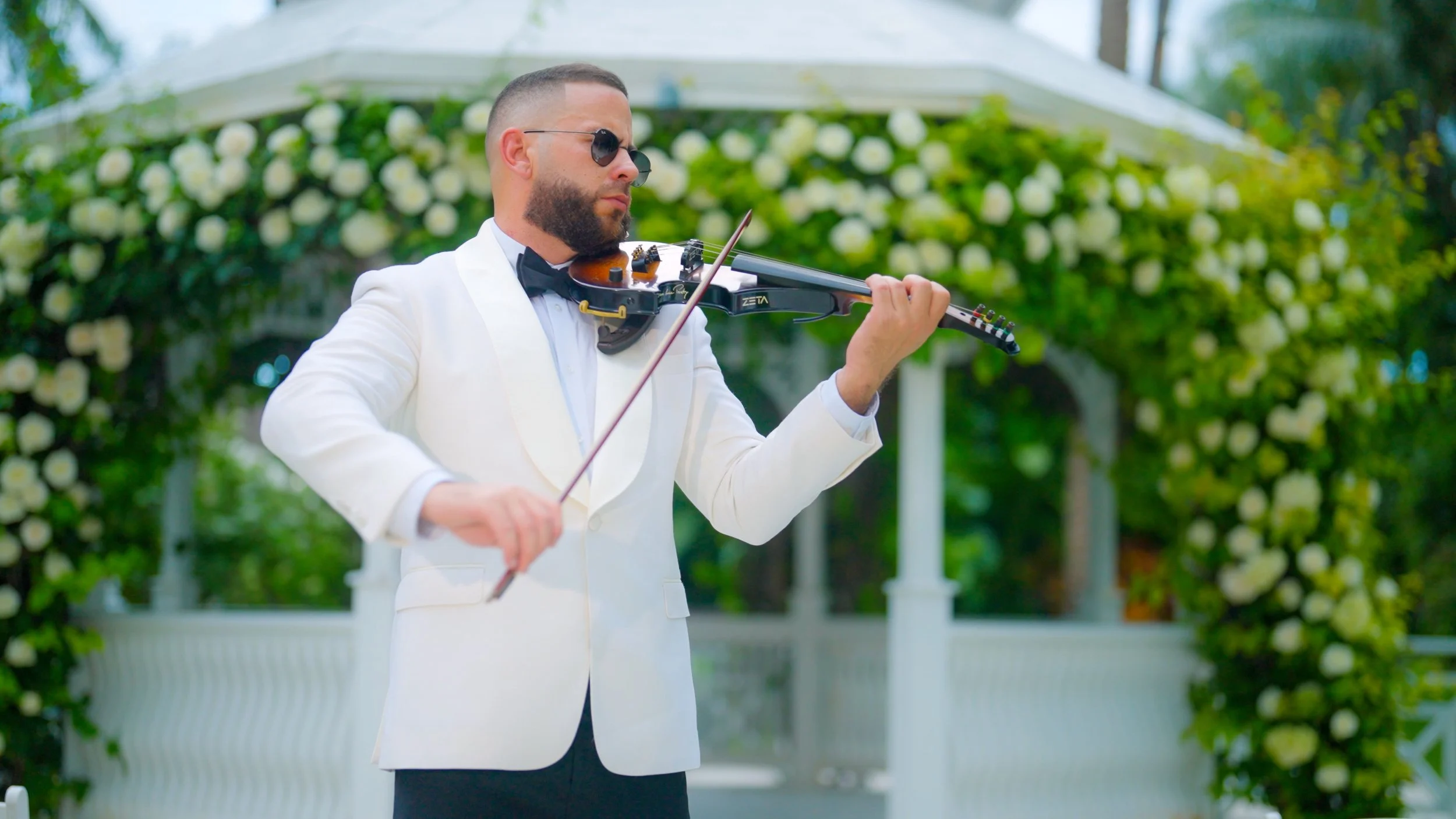 Live violin performance during wedding ceremony at The Palms Hotel & Spa in Miami Beach
