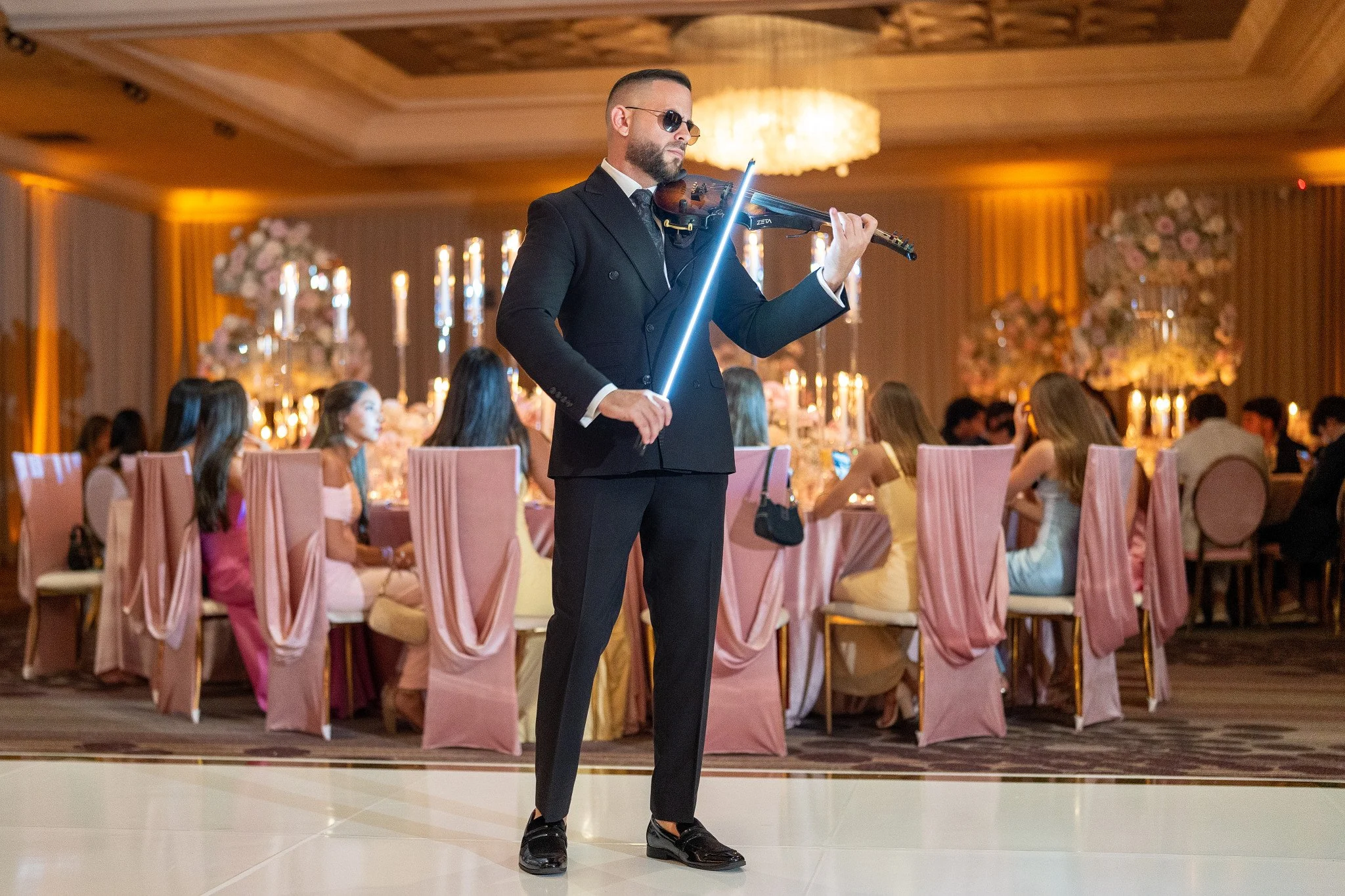 Luxury quinceañera violinist performing at Rusty Pelican in Miami