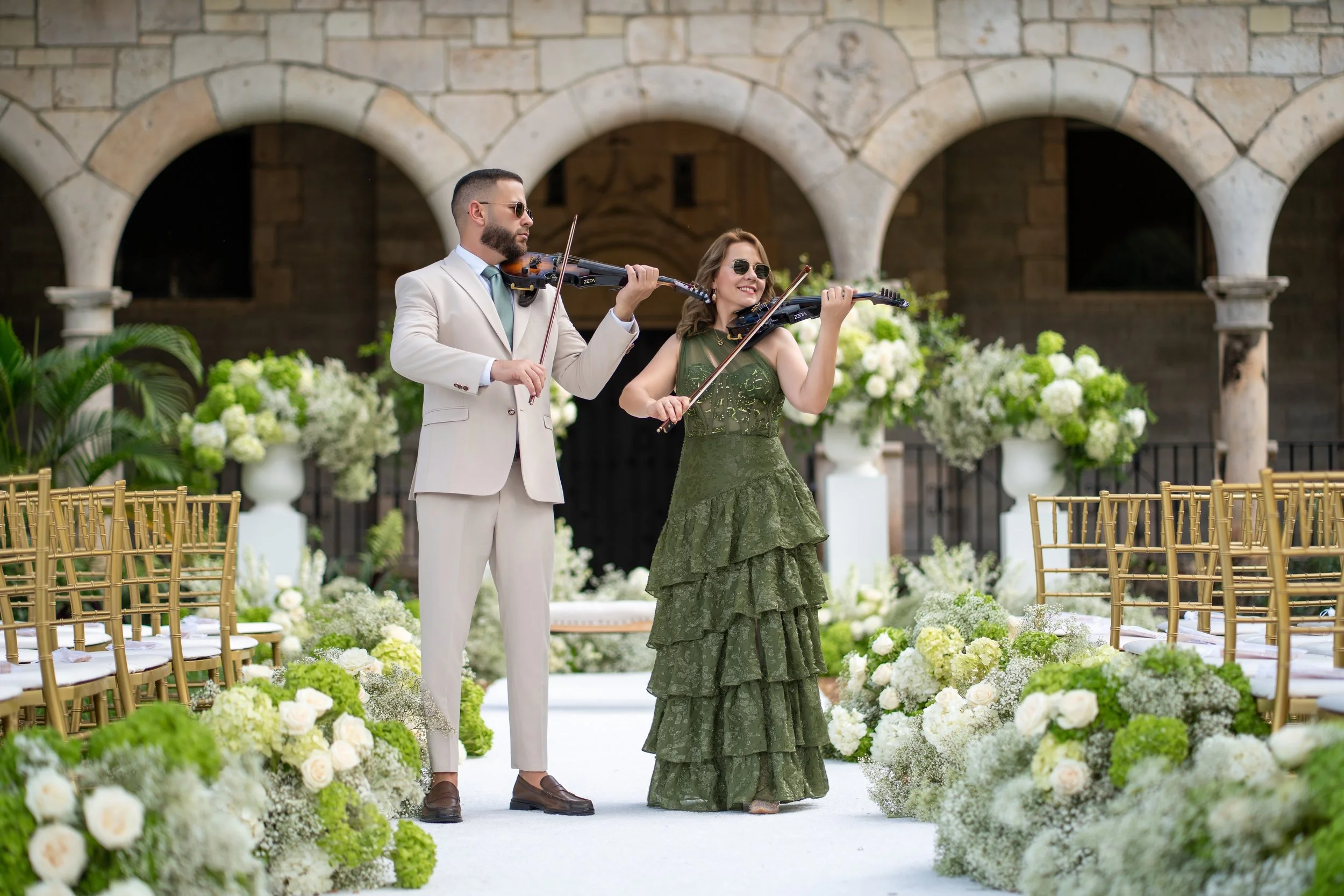 Wedding violinists performing live at The Ancient Spanish Monastery ceremony