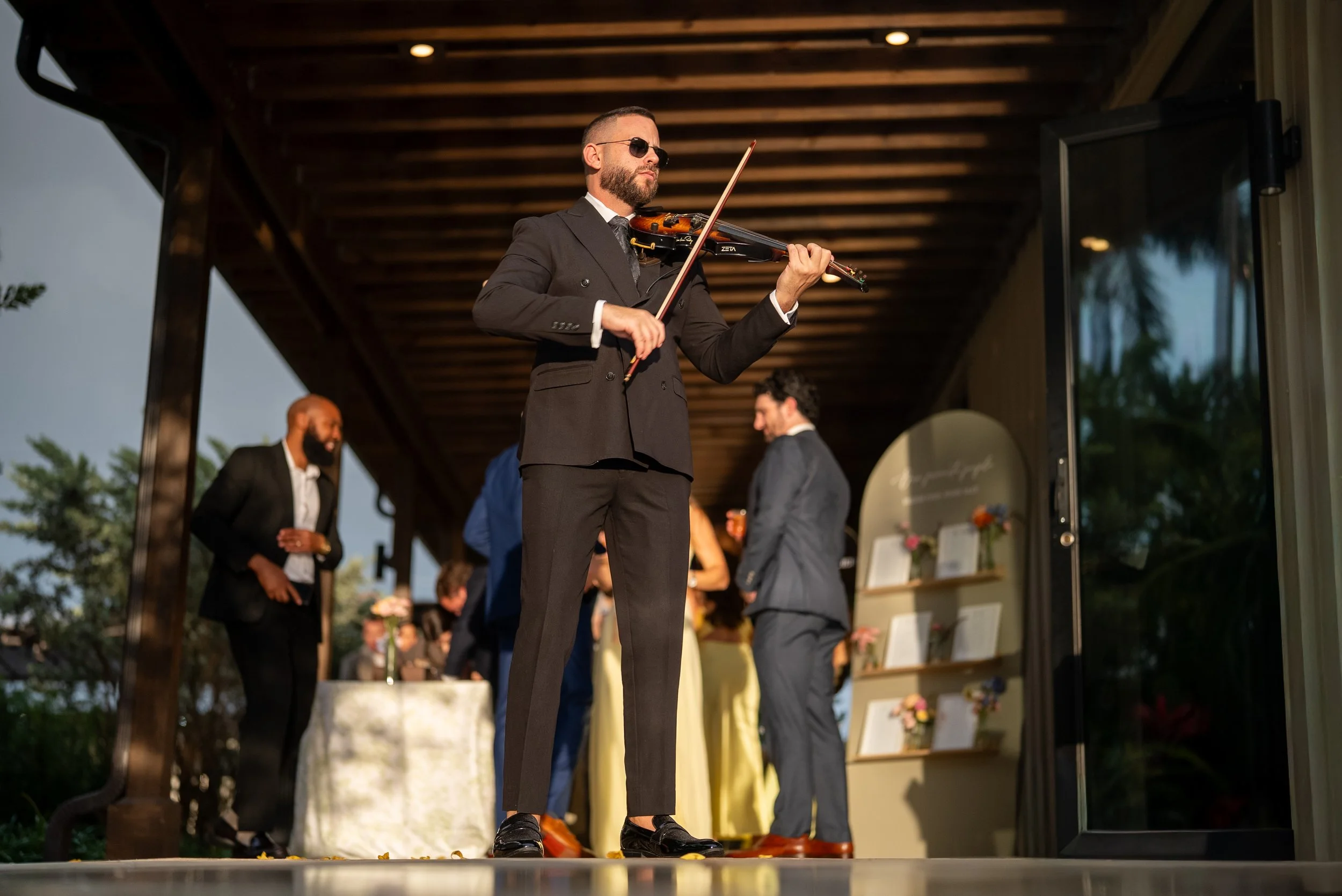 Cocktail hour violinist performing at Gran Paraiso Gardens in Miami