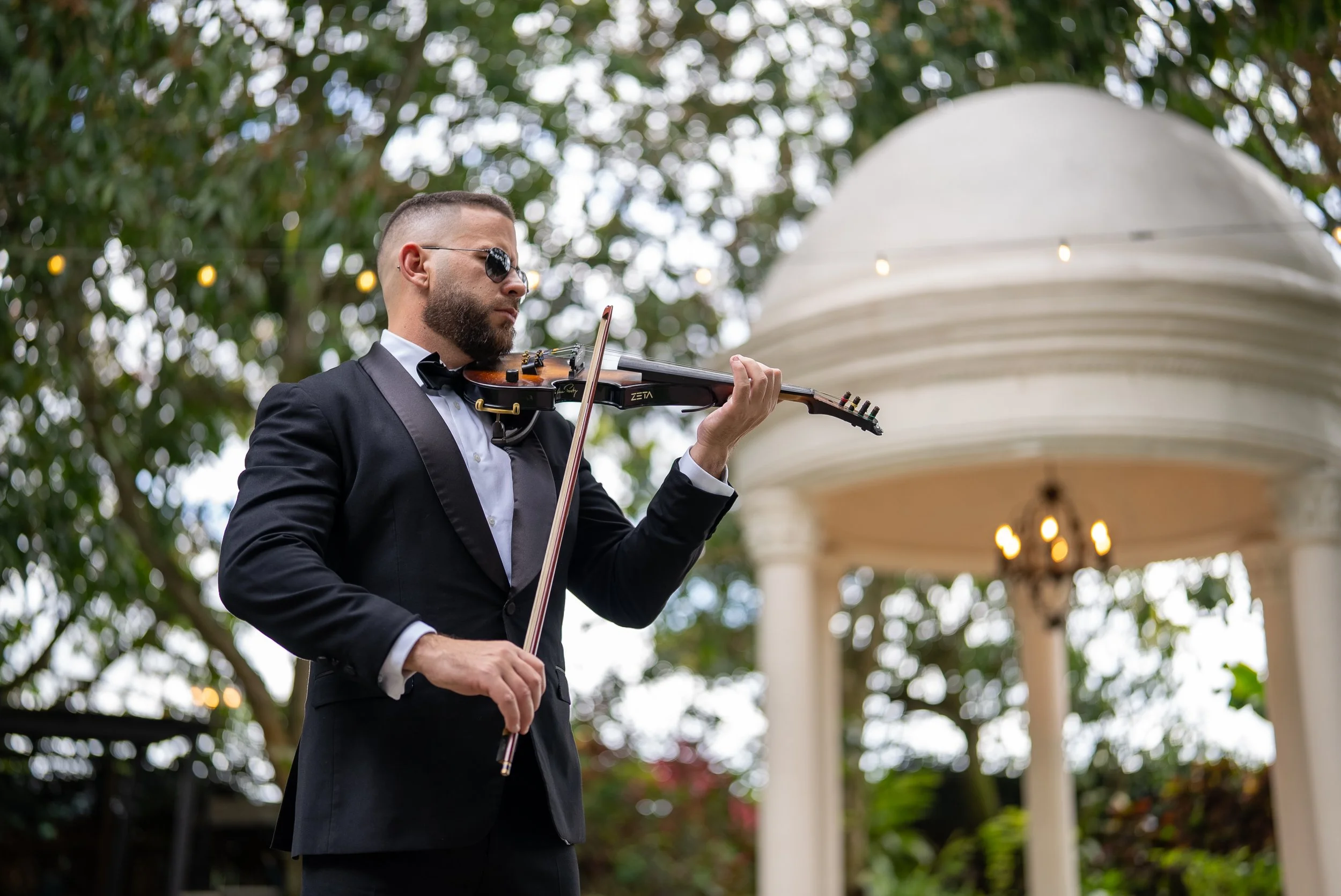 Live violin performance during wedding ceremony at Villa Toscana Miami