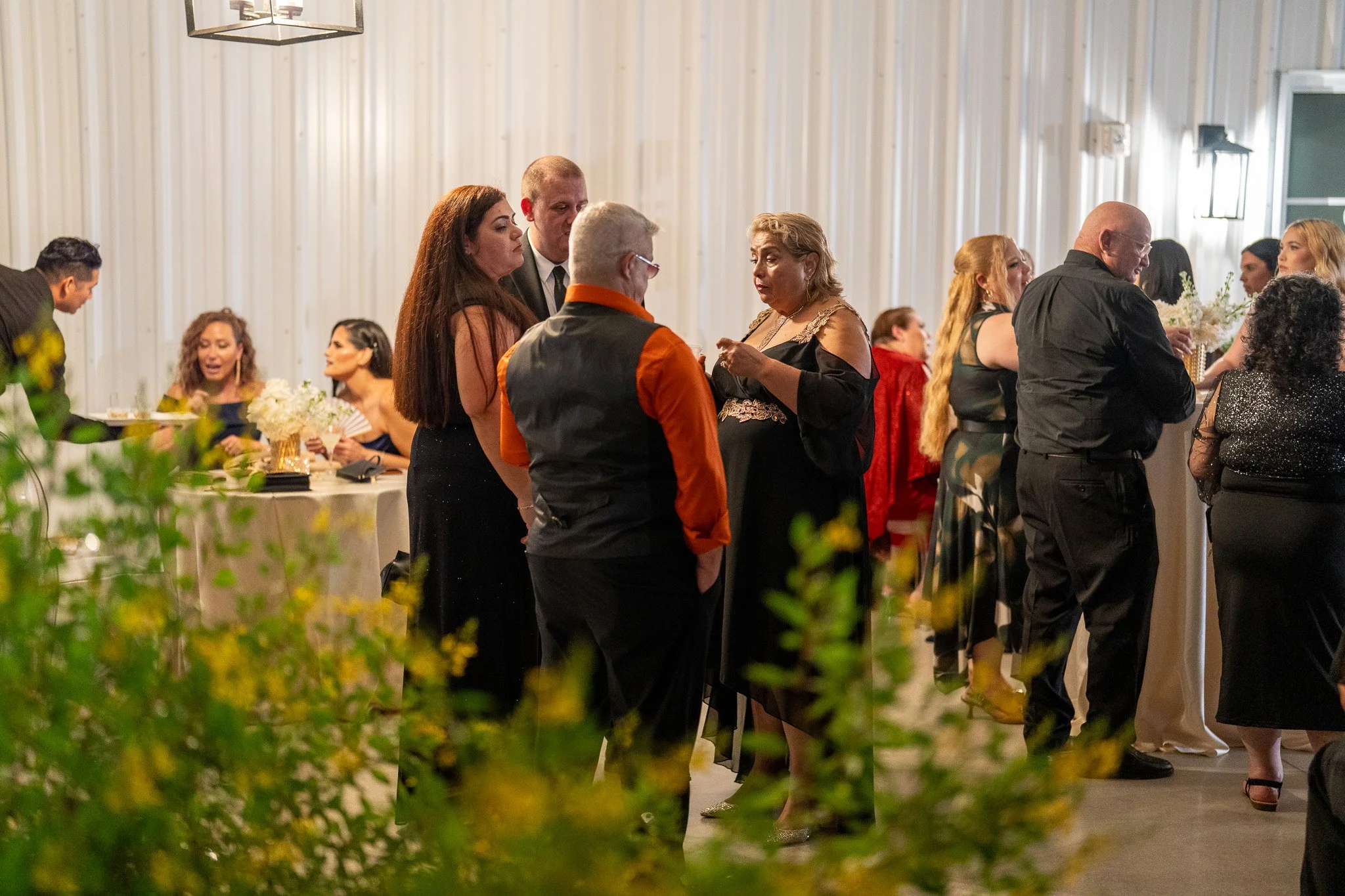 Wedding guests enjoying cocktail hour at The White Orchid in Miami