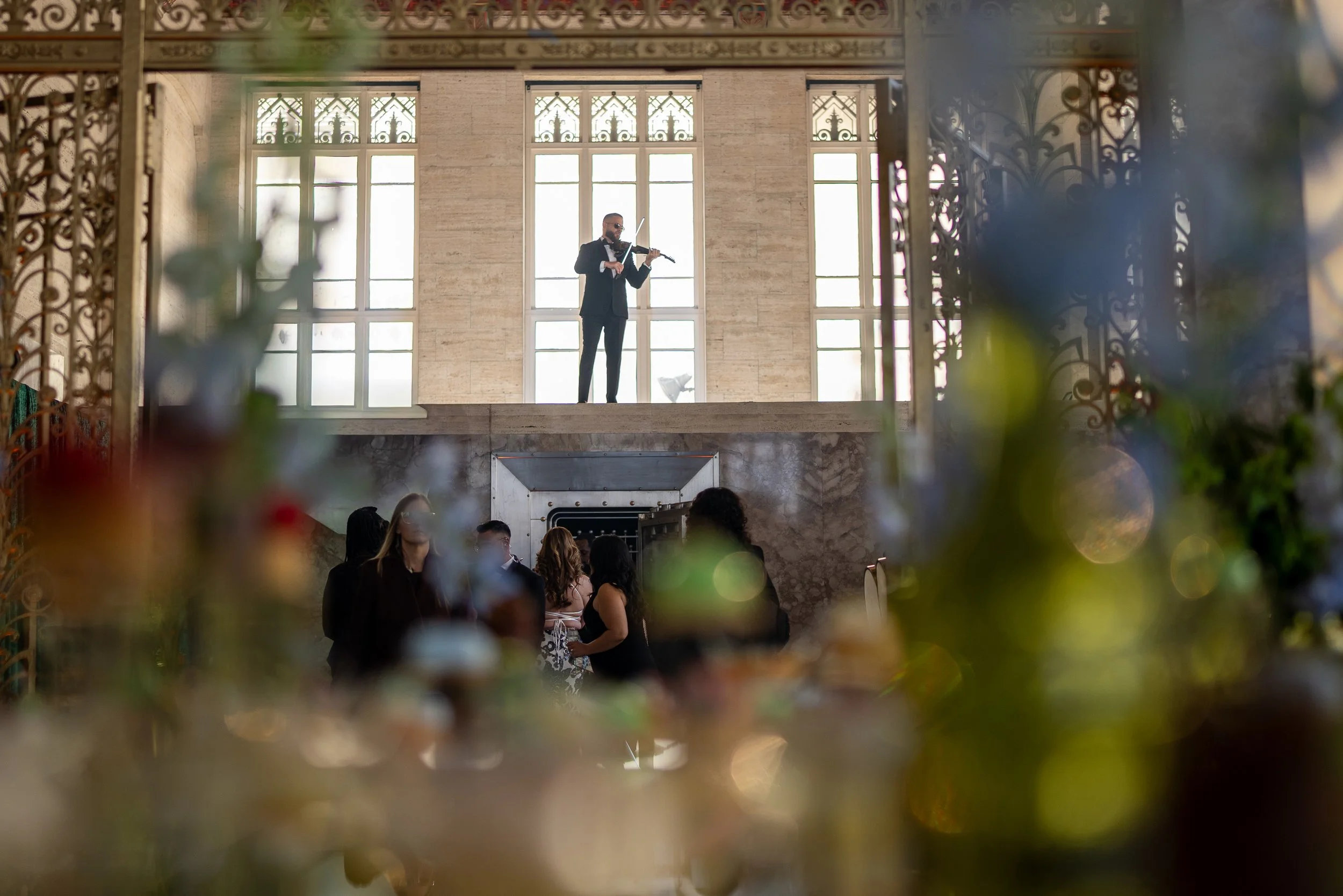 Live violinist at a luxury awards gala inside The Historic Alfred I. duPont Building in Miami