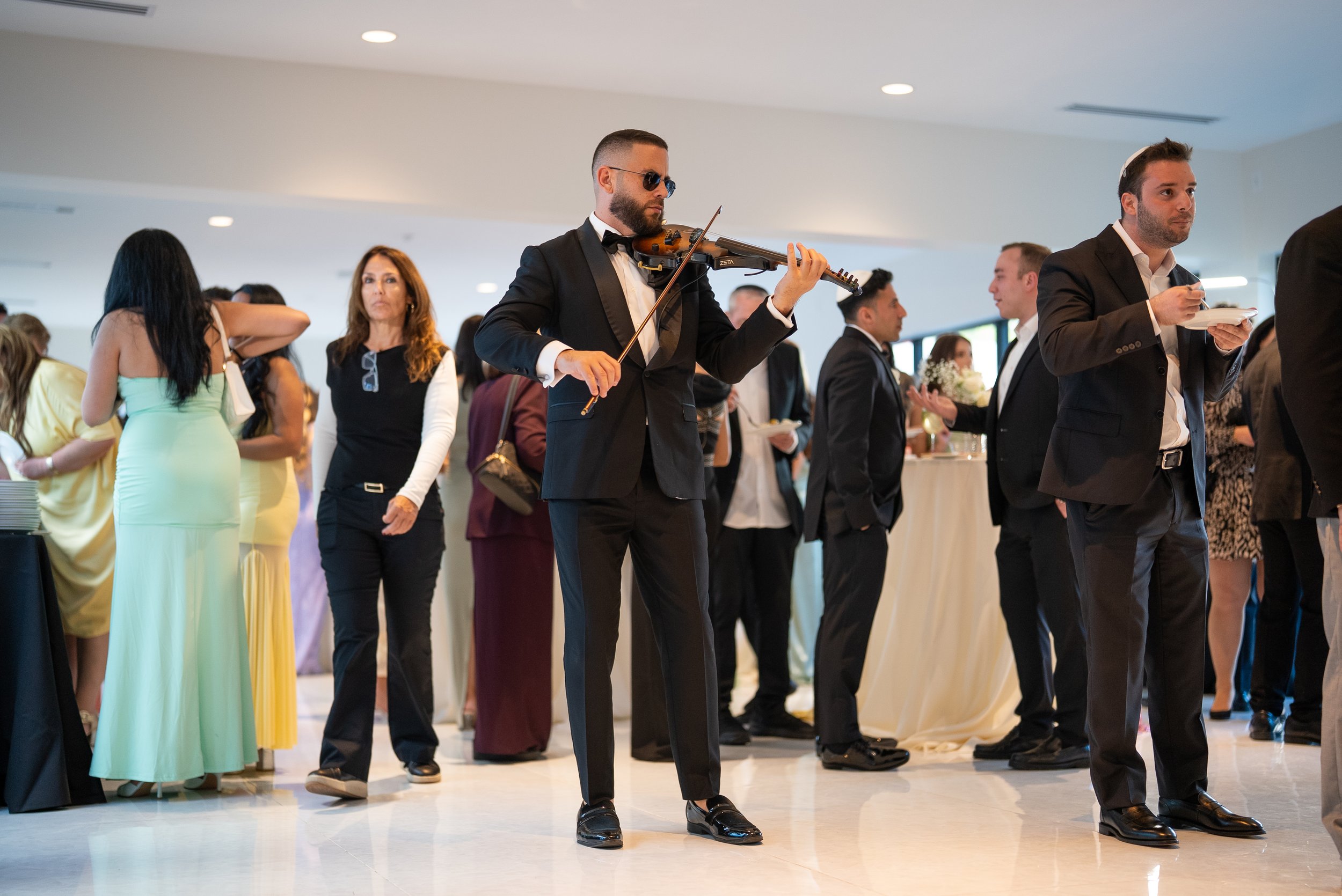 Cocktail hour violinist performing at The Glass Venue in Miami
