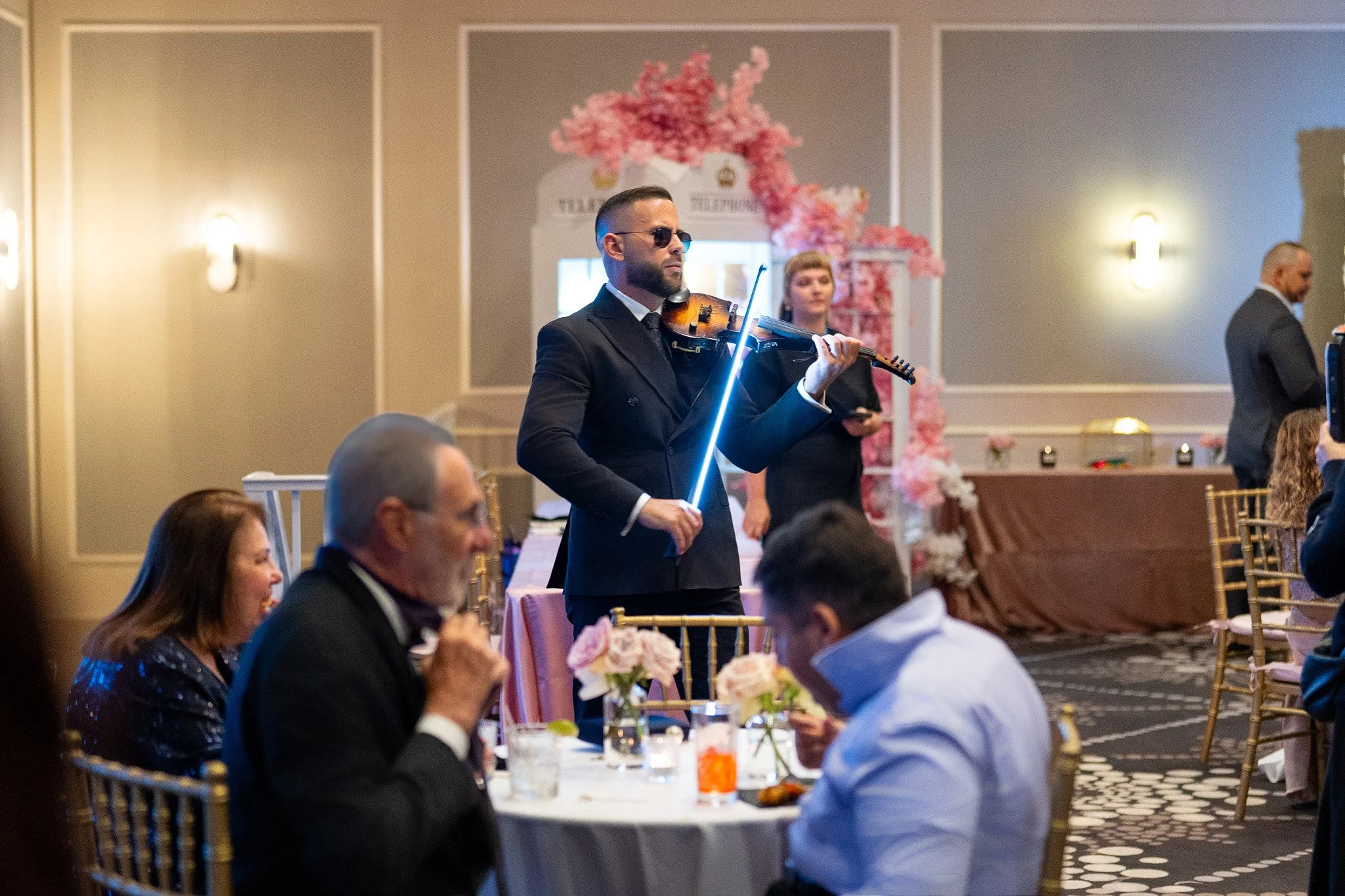 Live violin music during cocktail hour at Rusty Pelican in Miami