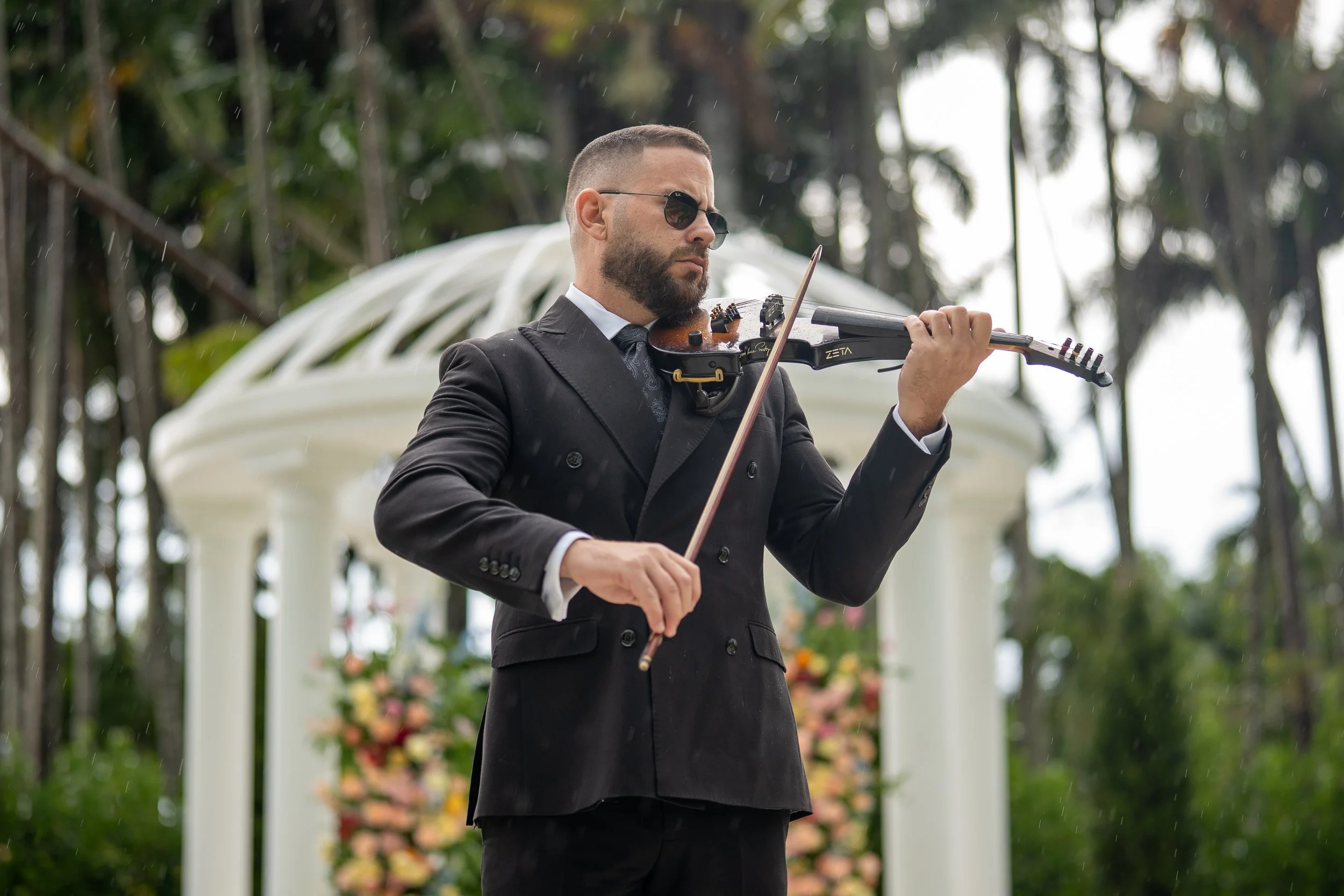 Live violin performance during wedding ceremony at Gran Paraiso Gardens Miami