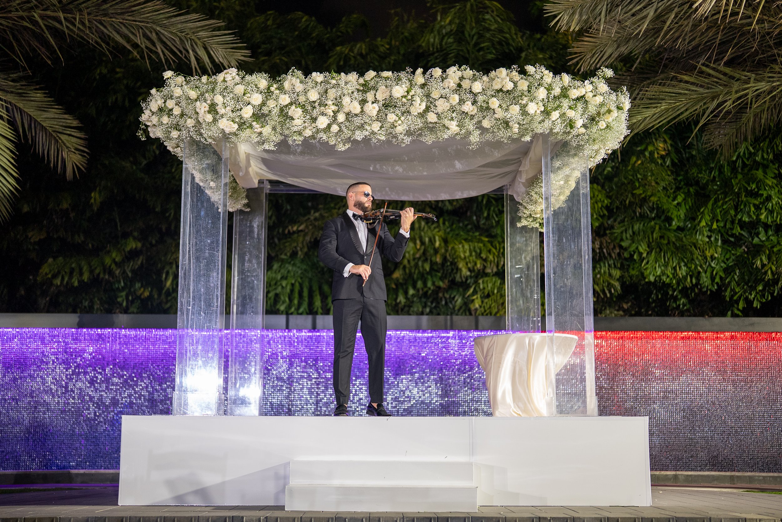 Wedding violinist performing during Jewish ceremony at The Glass Venue in Miami