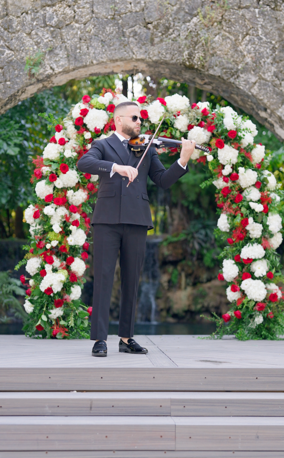Wedding violinist performing live at Secret Gardens Miami ceremony