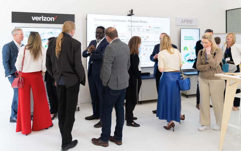 Photo of attendees networking at the Visionable CHC launch event