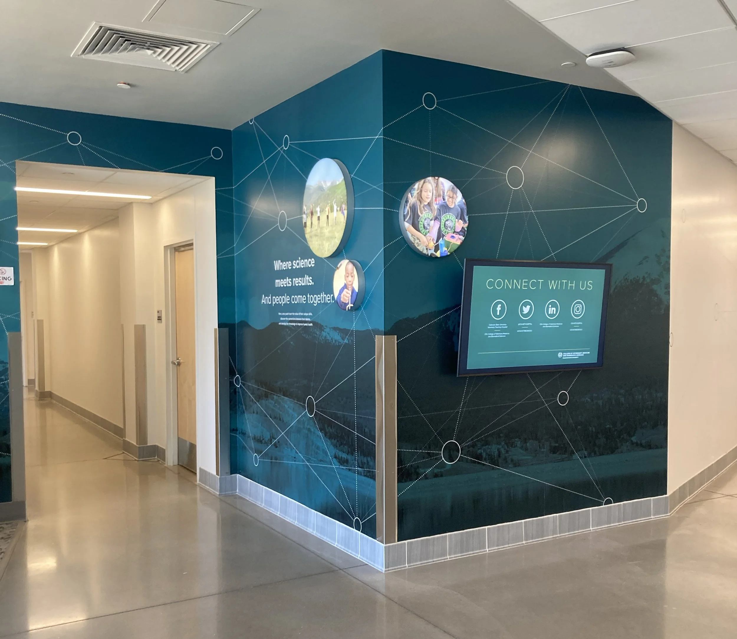 Wall graphic and TV monitor.