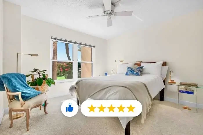 Picture of a luxurious bedroom in St. Petersburg with impact-rated windows representing Ambassador Window and Door's Impact-resistant windows and doors in the Tampa Bay Area