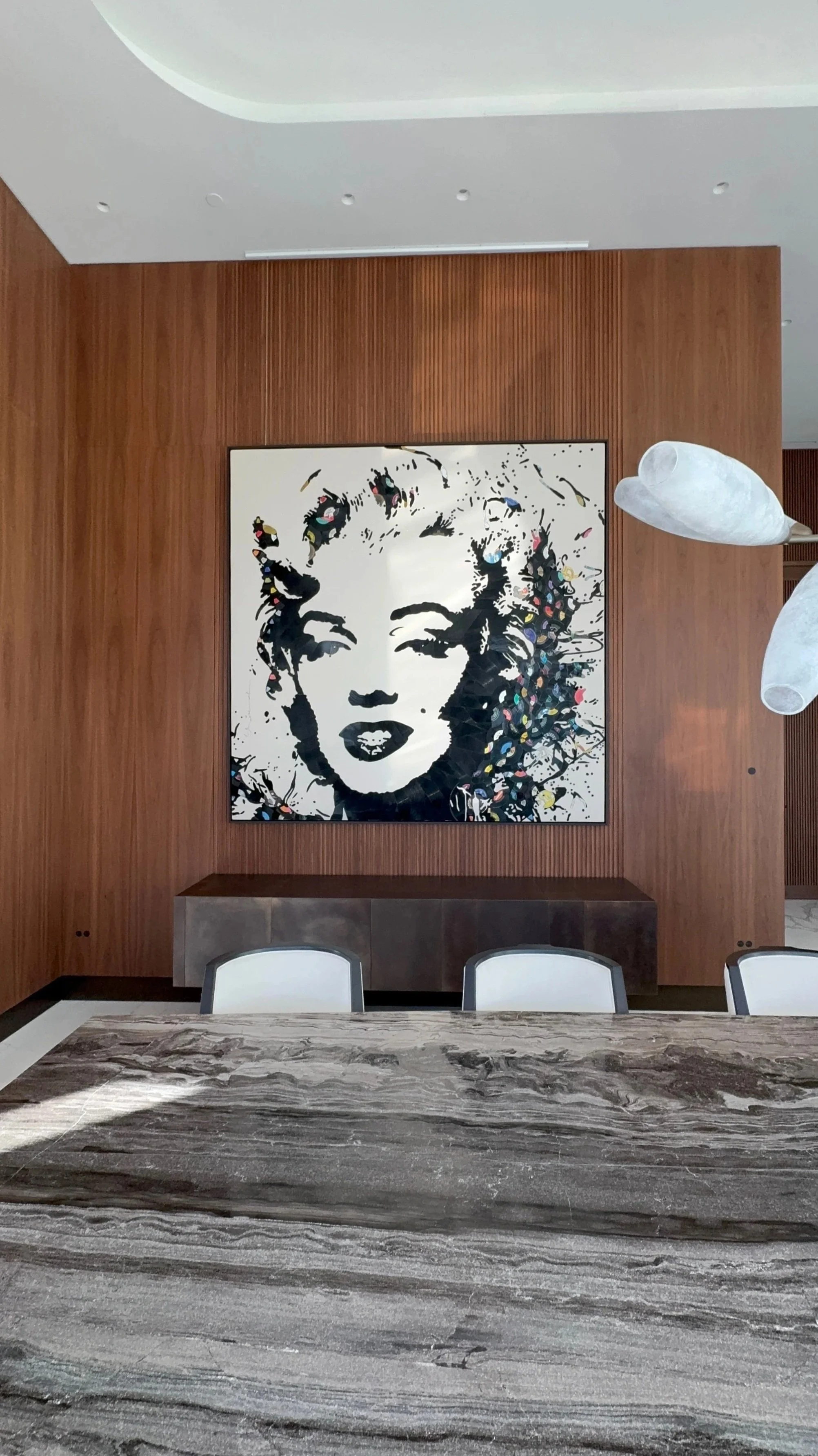 Mr.Brainwash record artwork, large portrait of Marilyn Monroe  set in a high end dining room