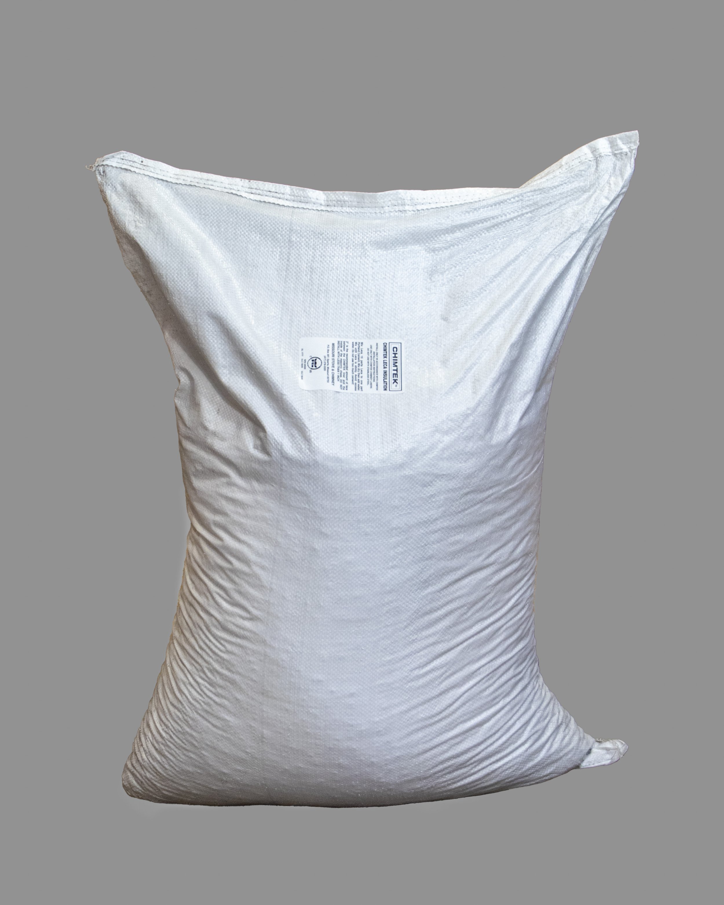 A large white bag with a label on it, placed against a gray background.