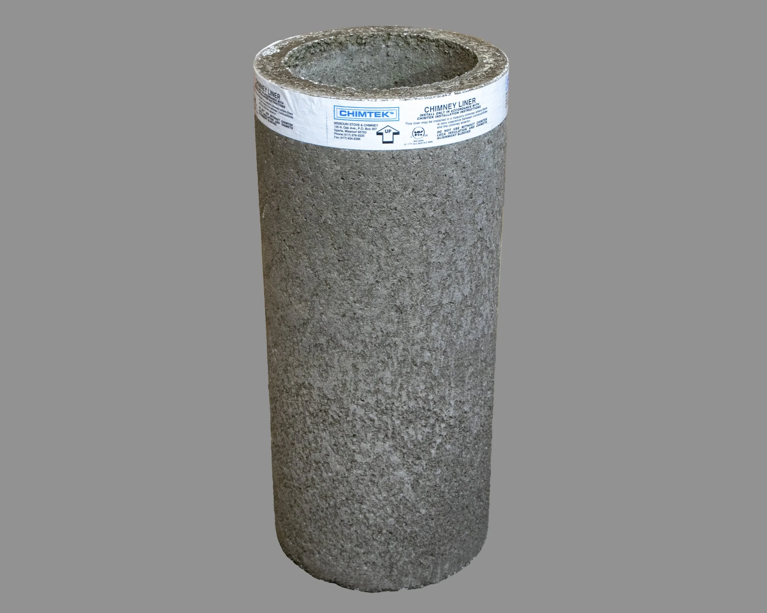 Concrete chimney liner roll with a white label around it showing blue text and black symbols.