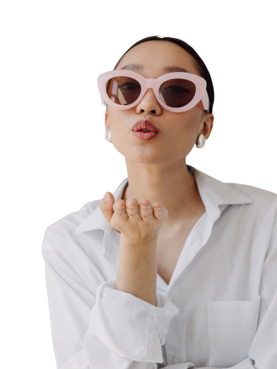 woman in sunglasses blowing kiss