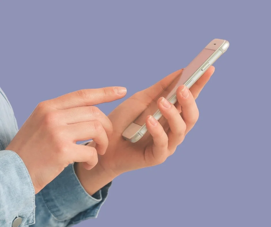 Telephone appointments - A client using a smartphone against a purple background.