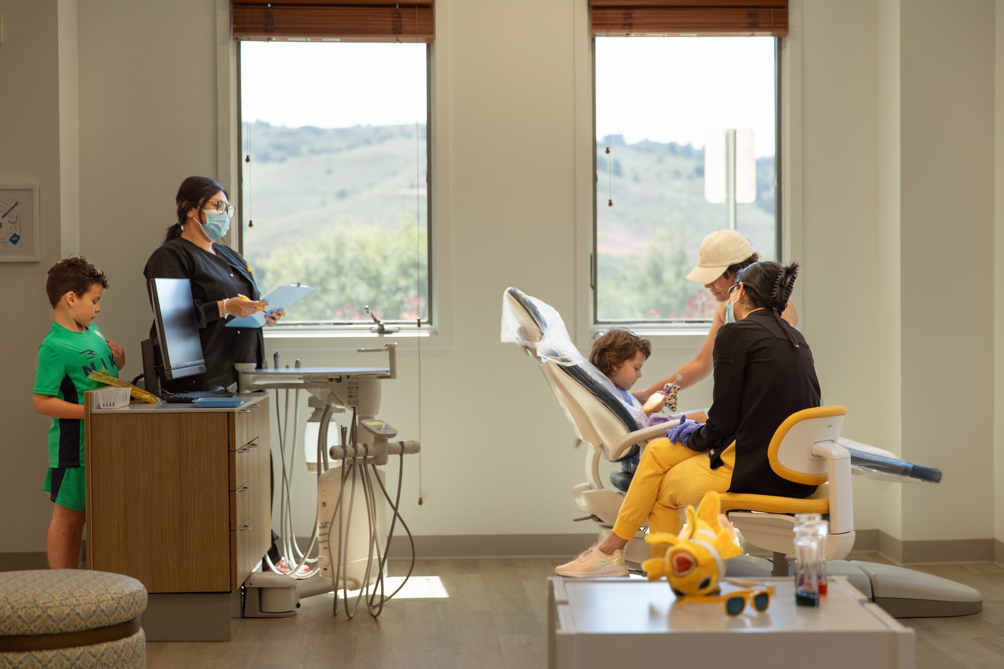Dr. Jackie caring for a young patient at Ryan Ranch Pediatric Dentistry in Monterey.