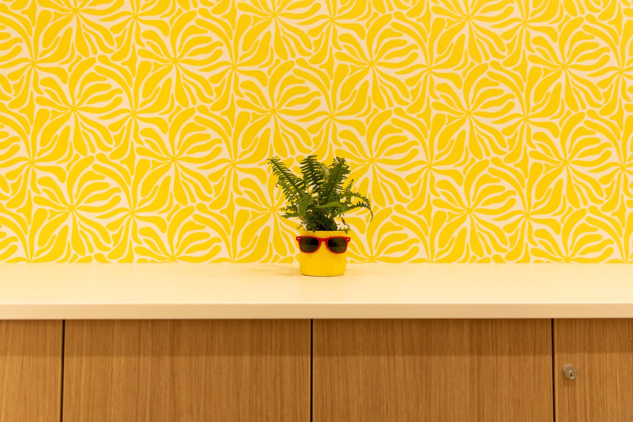Playful pineapple planter in the child-friendly waiting area at Ryan Ranch Pediatric Dentistry.