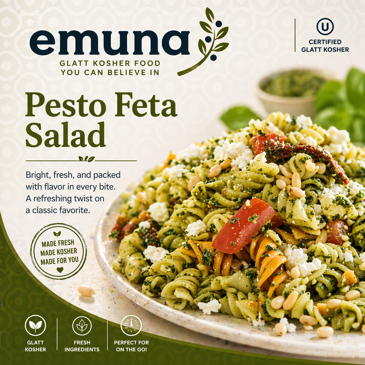 Packaging for Emuna Pesto Feta Salad featuring a vibrant image of pasta, tomatoes, and feta cheese, with textual descriptions emphasizing its freshness, flavor, and kosher certification.