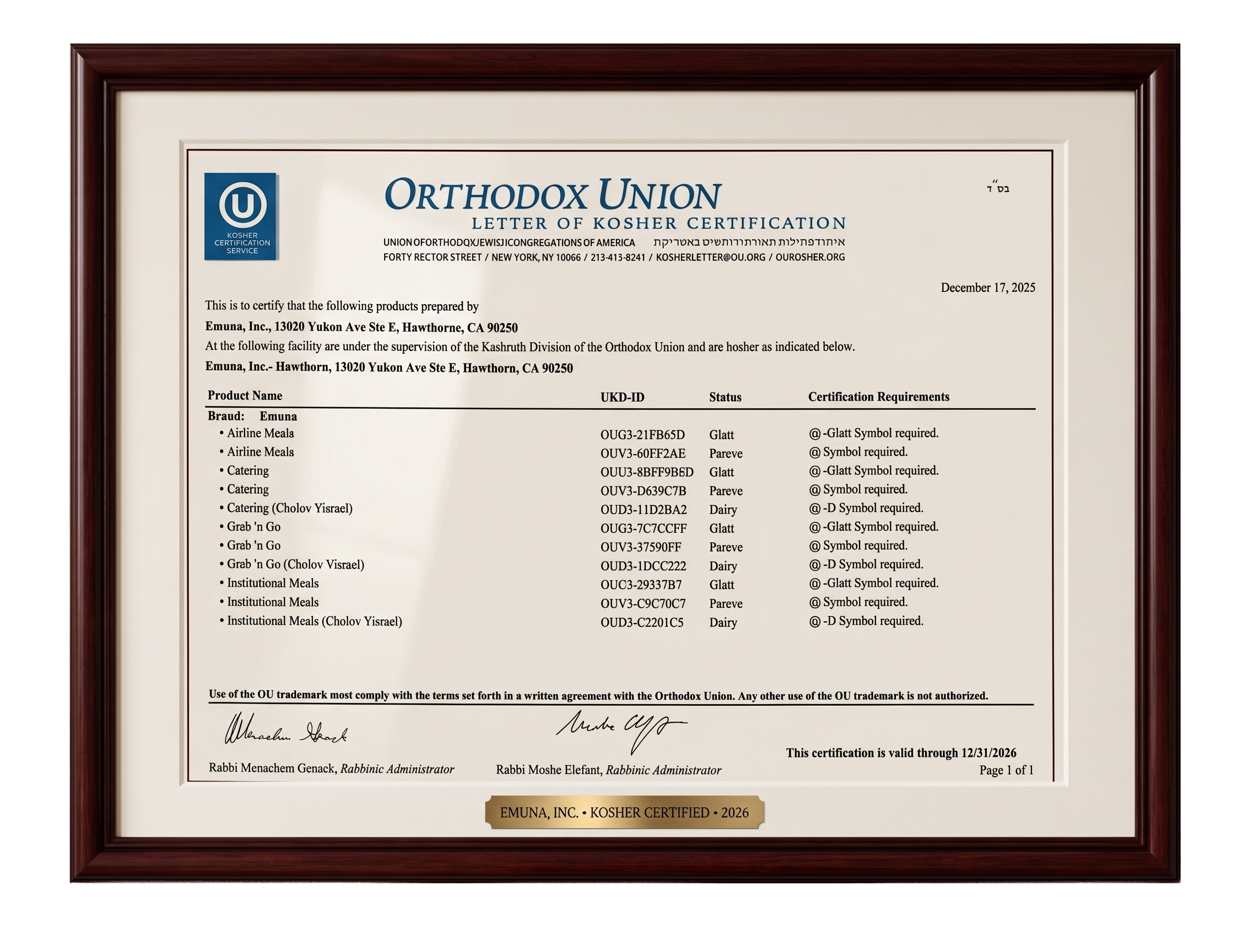 A framed kosher certification document from Orthodox Union, issued to Emuna, Inc., dated December 17, 2025, and valid through December 31, 2026, with signatures and signatures at the bottom.