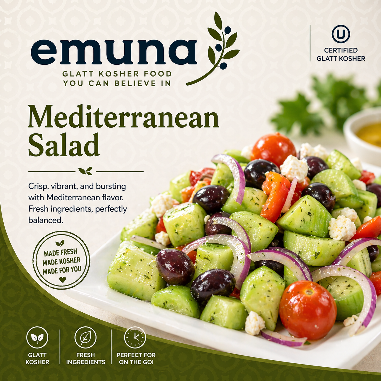 Package of emuna Mediterranean Salad with fresh vegetables including cherry tomatoes, cucumbers, red onions, black olives, and feta cheese, garnished with herbs, with a bowl of dressing in the background.