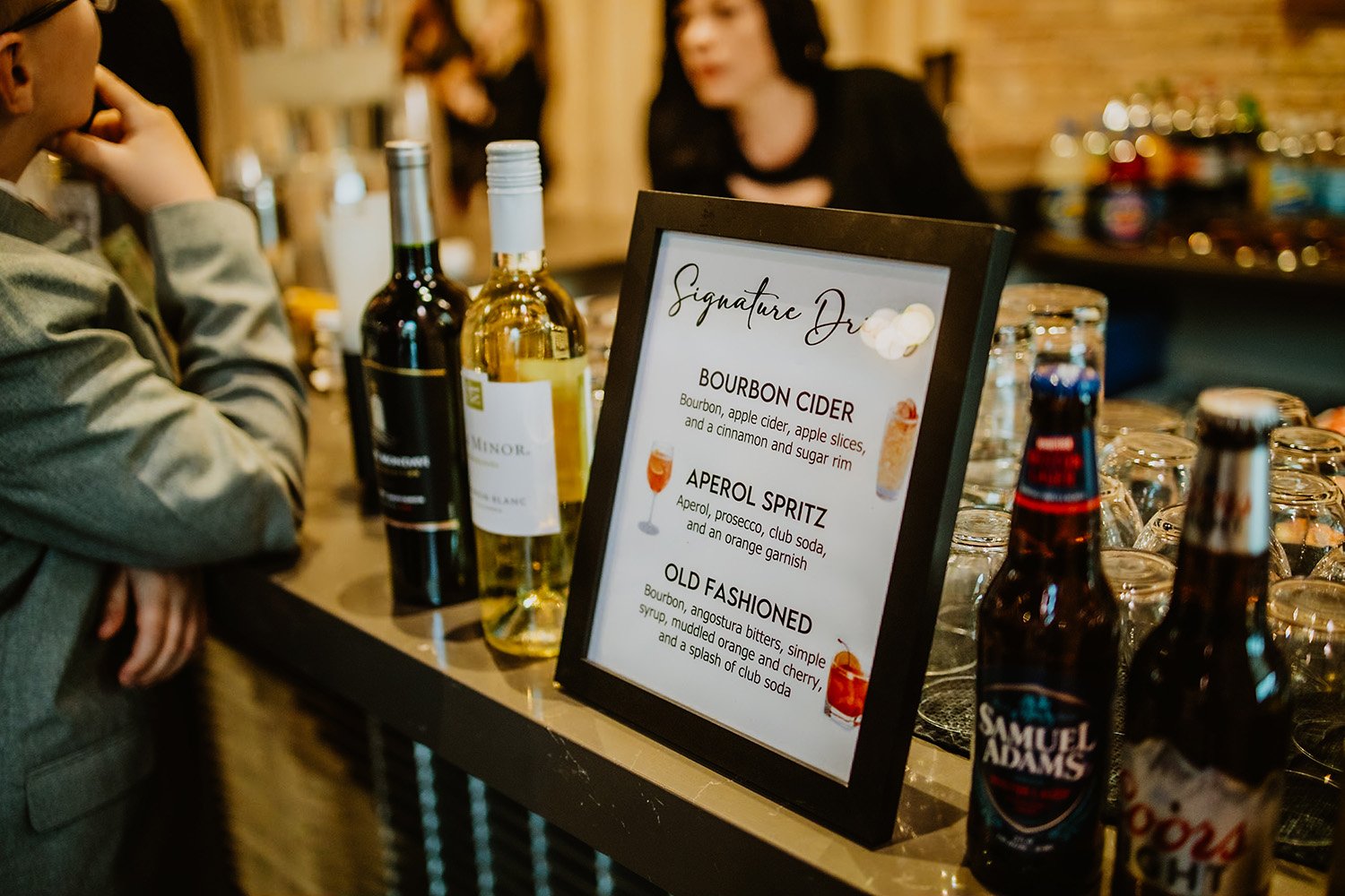 guest at the bar ordering a drink at a wedding