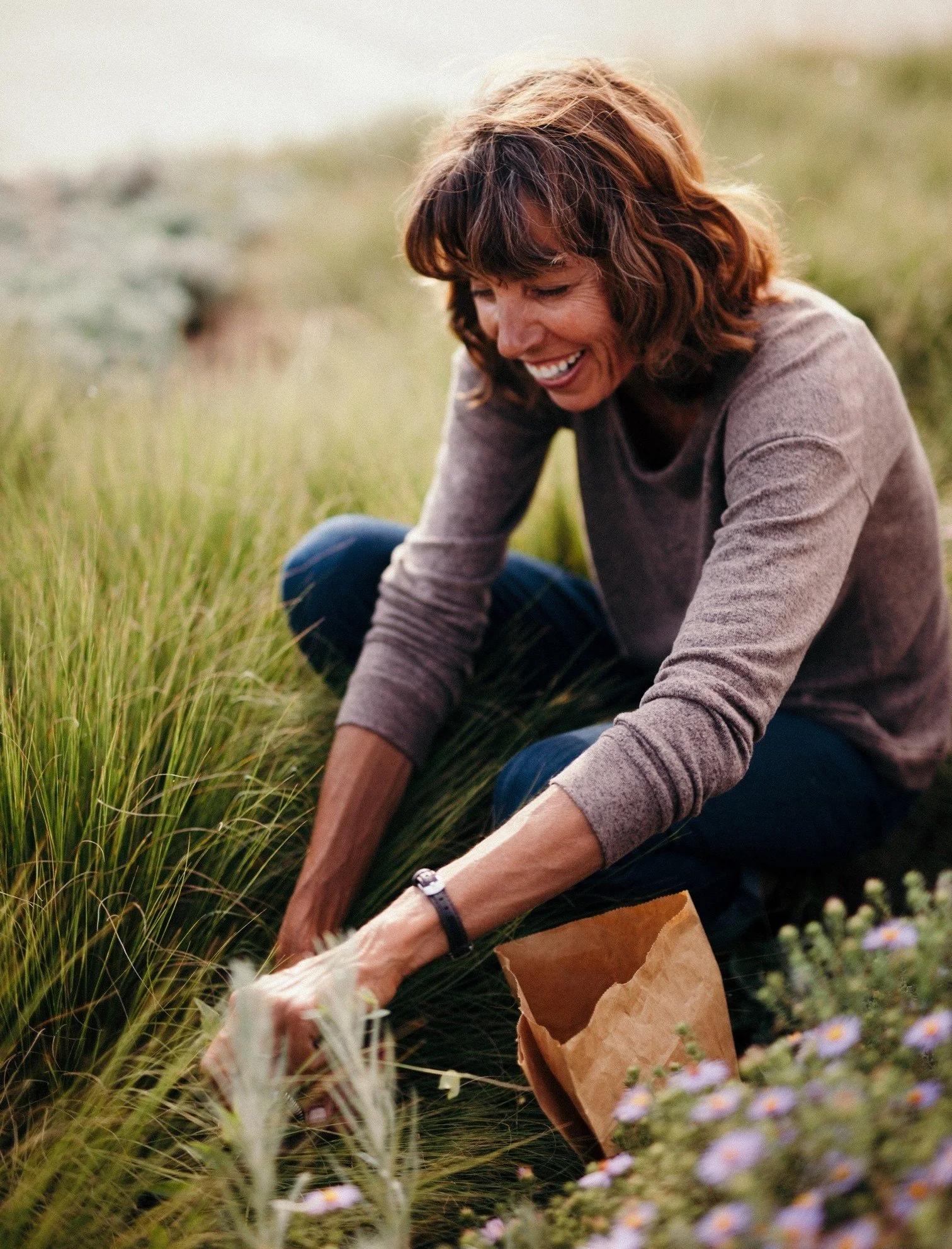 Lauren Springer tending to a garden.