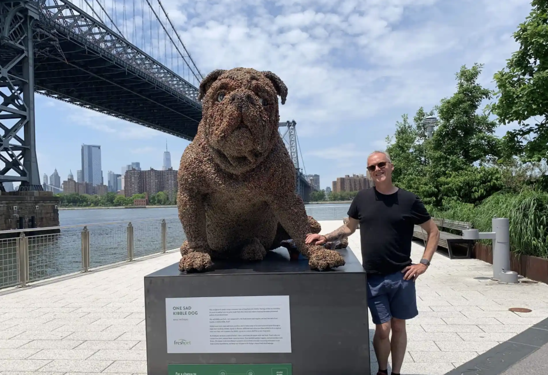 Artist debuts dog sculpture made completely out of kibble in Domino Park