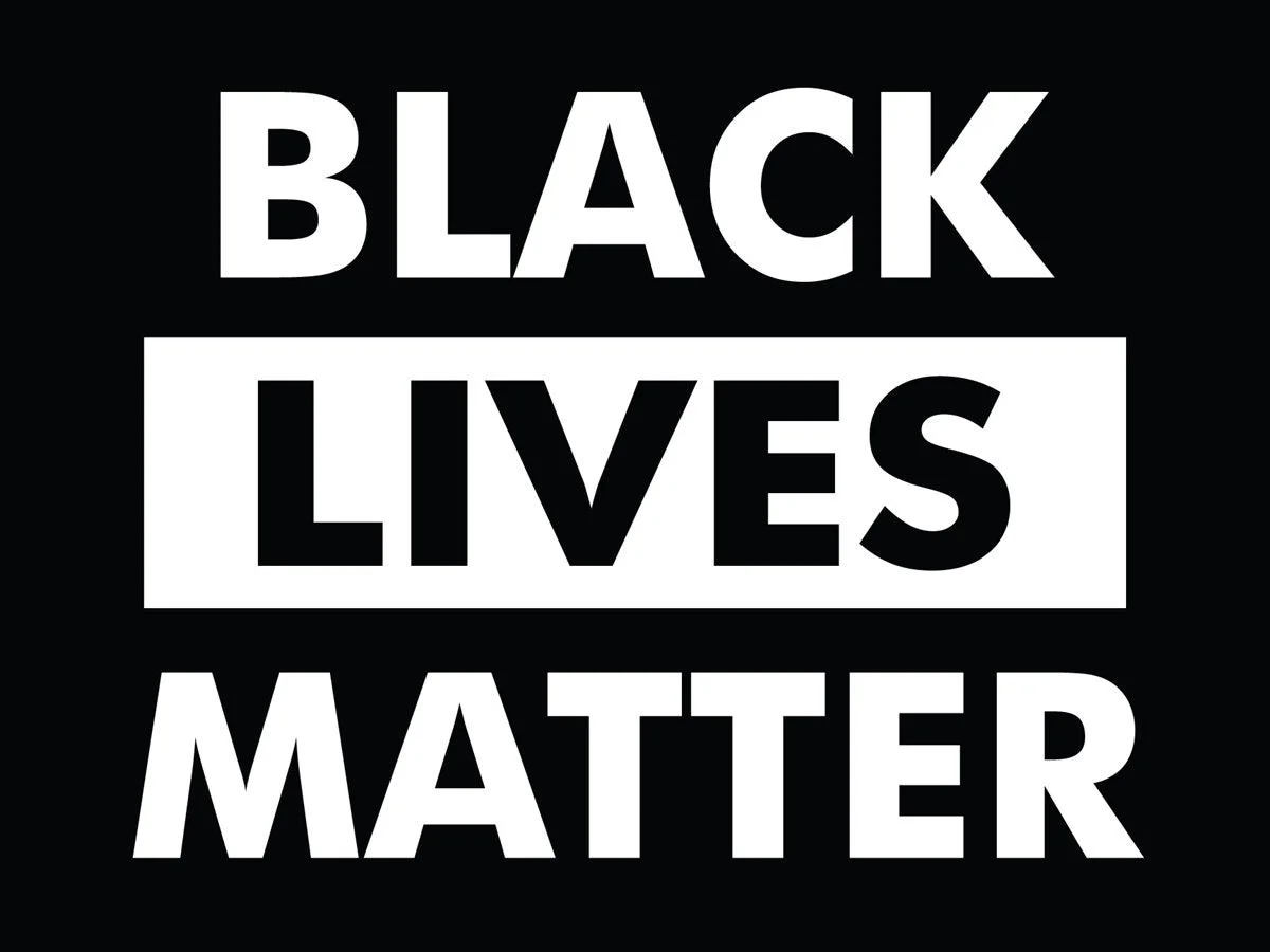 Black Lives Matter slogan in bold white letters on a black background