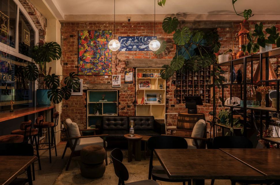 Cosy couch corner at the distillery in Drews Ave in front of brick wall